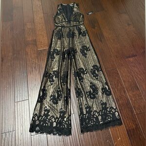 🔖🔖🔖NEW WITH TAGS LACE JUMPSUIT SIZE S
